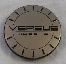 VERSUS BRONZE CAP